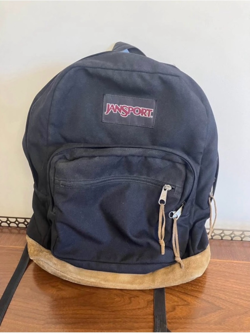 Jansport Black Backpack with Tan Suede Base and Red Logo